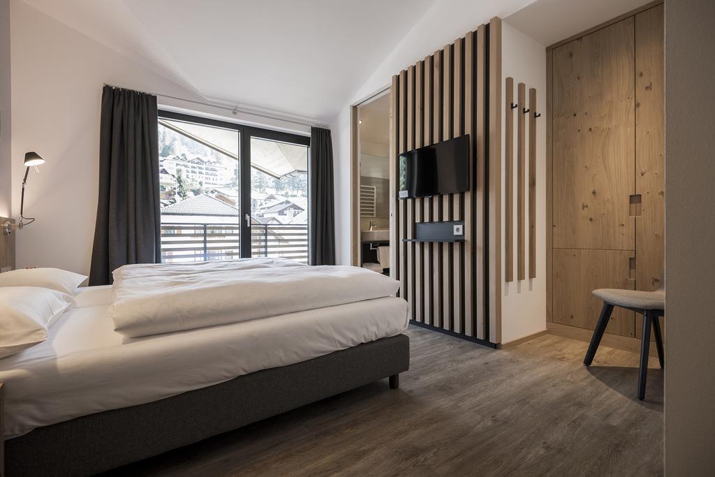 Residence Hotel Fever Ортизей Екстериор снимка